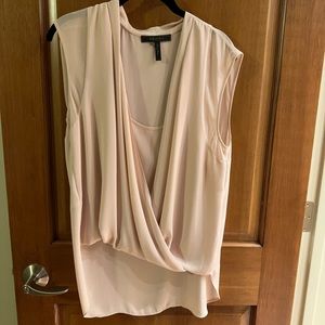 Sleeveless pale pink blouse. Excellent condition.